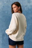 women coastal white navy sweater summer layering outfit back  view