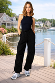 women black parachute cargo pants athleisure outfit front view