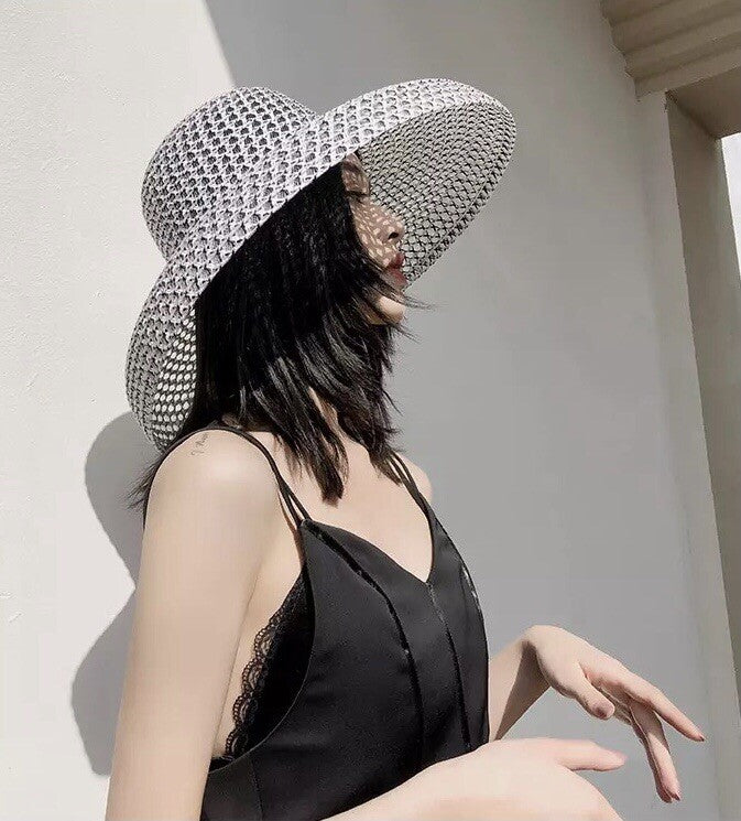 women coastal hat black wide brim sun protection beach look
