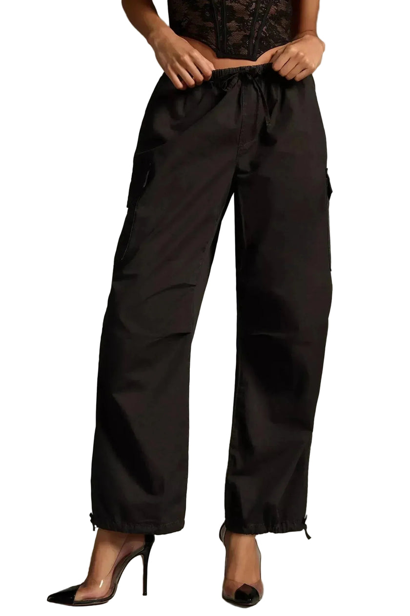 women black parachute cargo pants athleisure outfit front view