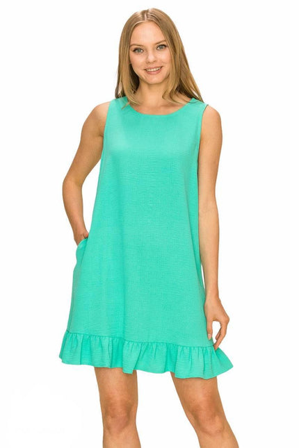 Sleeveless shift dress with ruffled hem & pockets