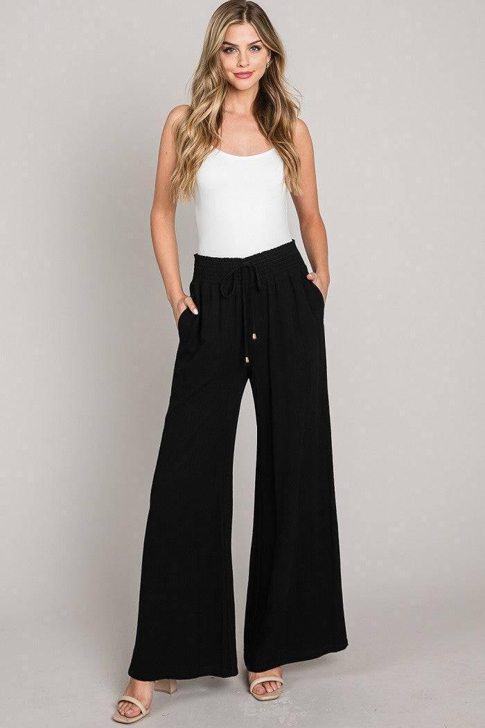 women black wide leg linen pants resort vacation full length front view
