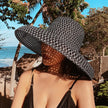 women beach hat black woven sun hat vacation outfit styling

