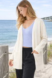 women cream midi open front cardigan with pockets everyday layering front view