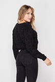 women cable knit cropped sweater texture detail close up