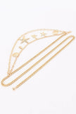 women resort wear belt gold layered waist chain styled outfit

