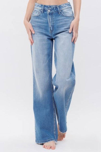 MICA Asymmetric crossover Waist Frayed Heel Jeans