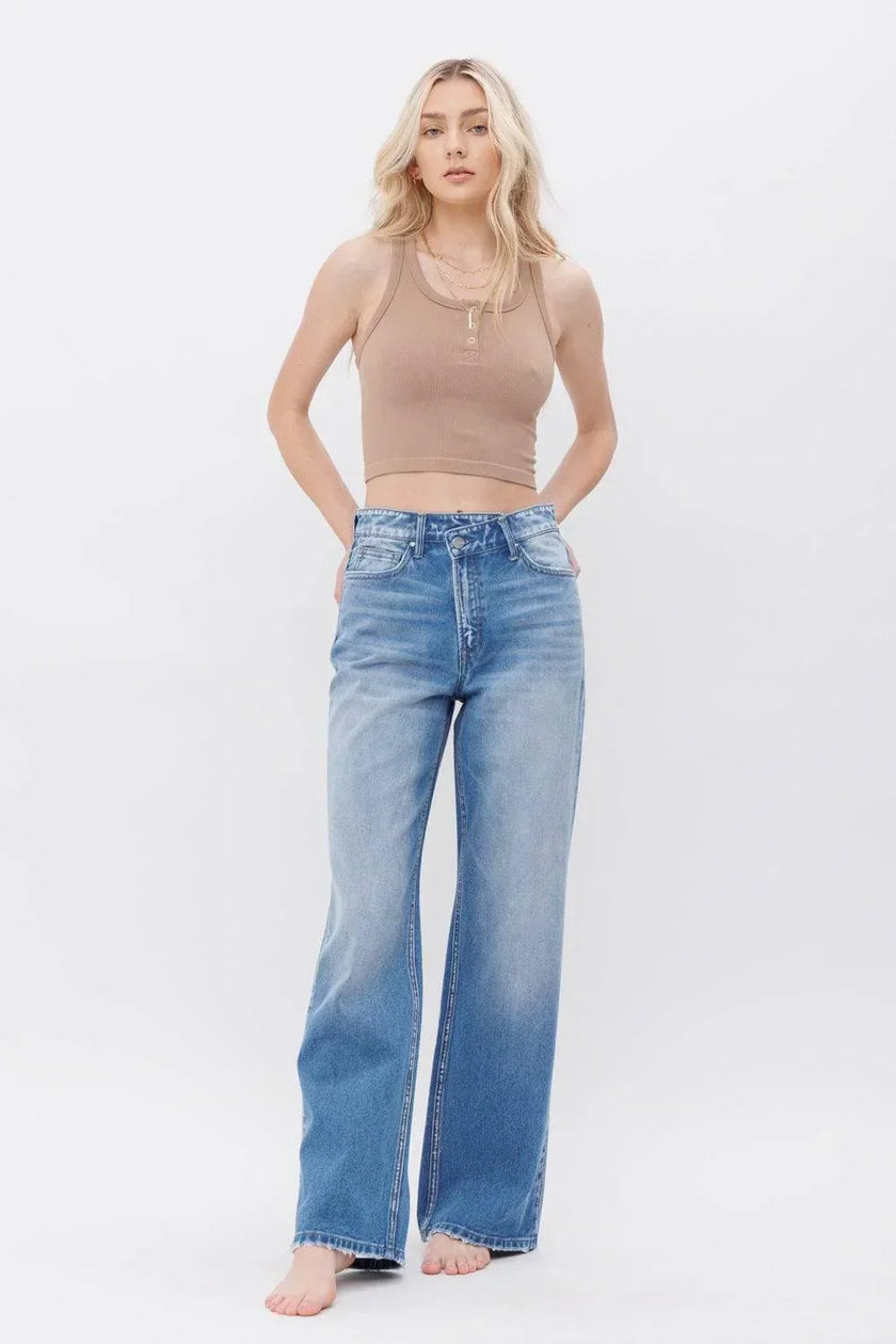 MICA Asymmetric crossover Waist Frayed Heel Jeans
