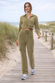 women olive terry cloth lounge set cropped jacket and cargo pants front view