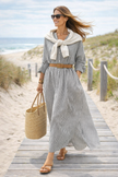 women black white striped maxi dress oversized coastal vacation outfit front view