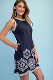 women’s white summer mini dress with linen blend fabric and navy floral embroider