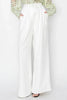 woman white resort wear wide leg pants coastal outfit

