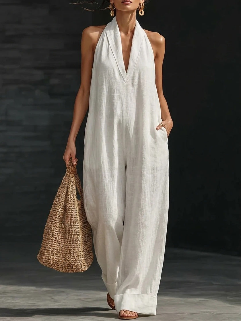 women white wide leg jumpsuit relaxed fit beach outfit walking boardwalk


