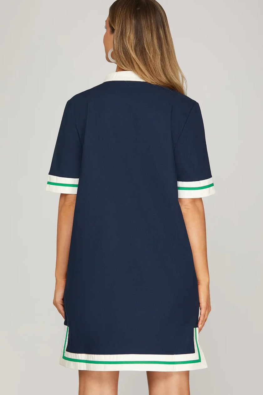 women preppy navy shift dress green trim resort wear outfit close up back view