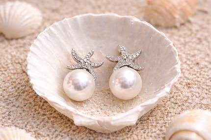 women silver starfish pearl stud earrings coastal jewelry front view