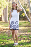 women’s white embroidered linen blend mini dress with navy floral hem and pockets